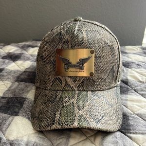 Robin’s jeans hat snake skin